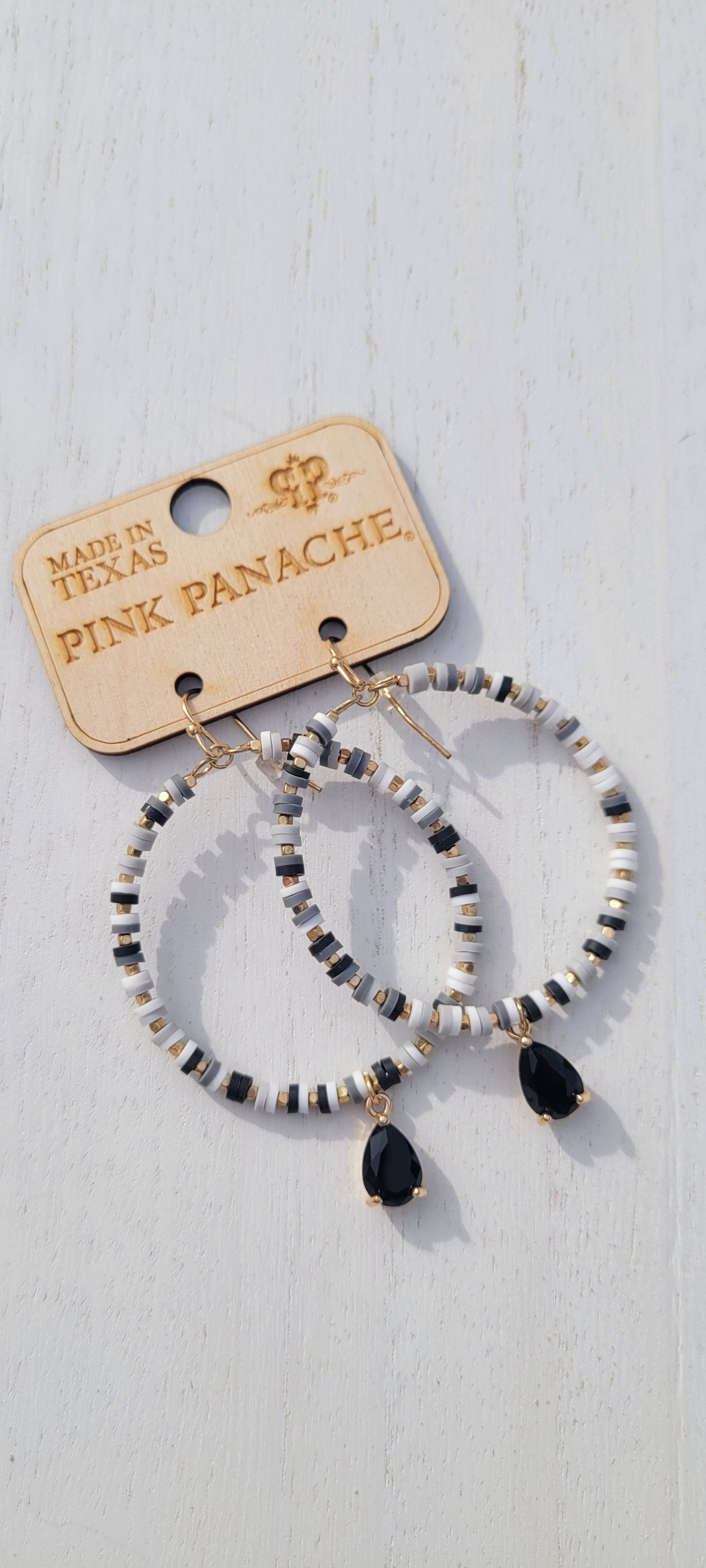 Pink Panache Earrings Color: Black and white rubber bead circle earring with black stone drop Limited supply!   