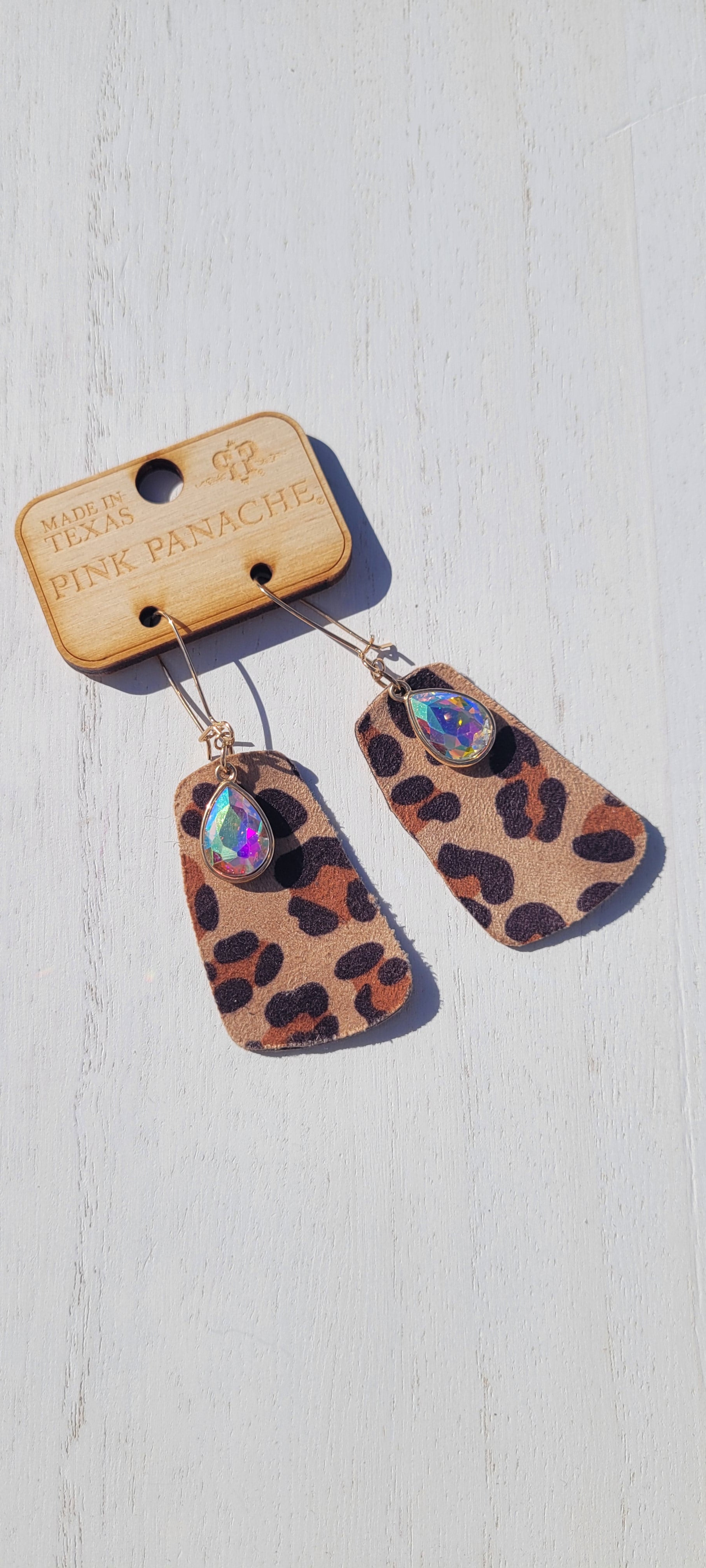 Pink Panache Earrings Color: Tan leopard leather rectangle with AB teardrop rhinestone on gold kidney wire earring Limited supply!