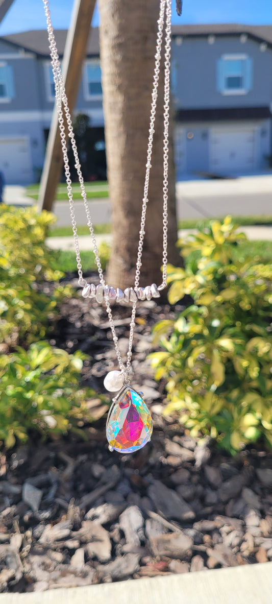 Pink Panache necklace Color: Delicate silver double chain necklace with silver chips, pearl bead and large AB teardrop Limited supply!