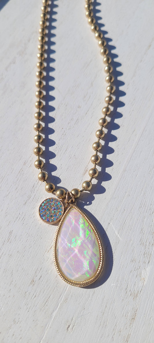 Pink Panache necklace Color: Silver chain necklace with diamond shape and AB teardrop Limited supply!