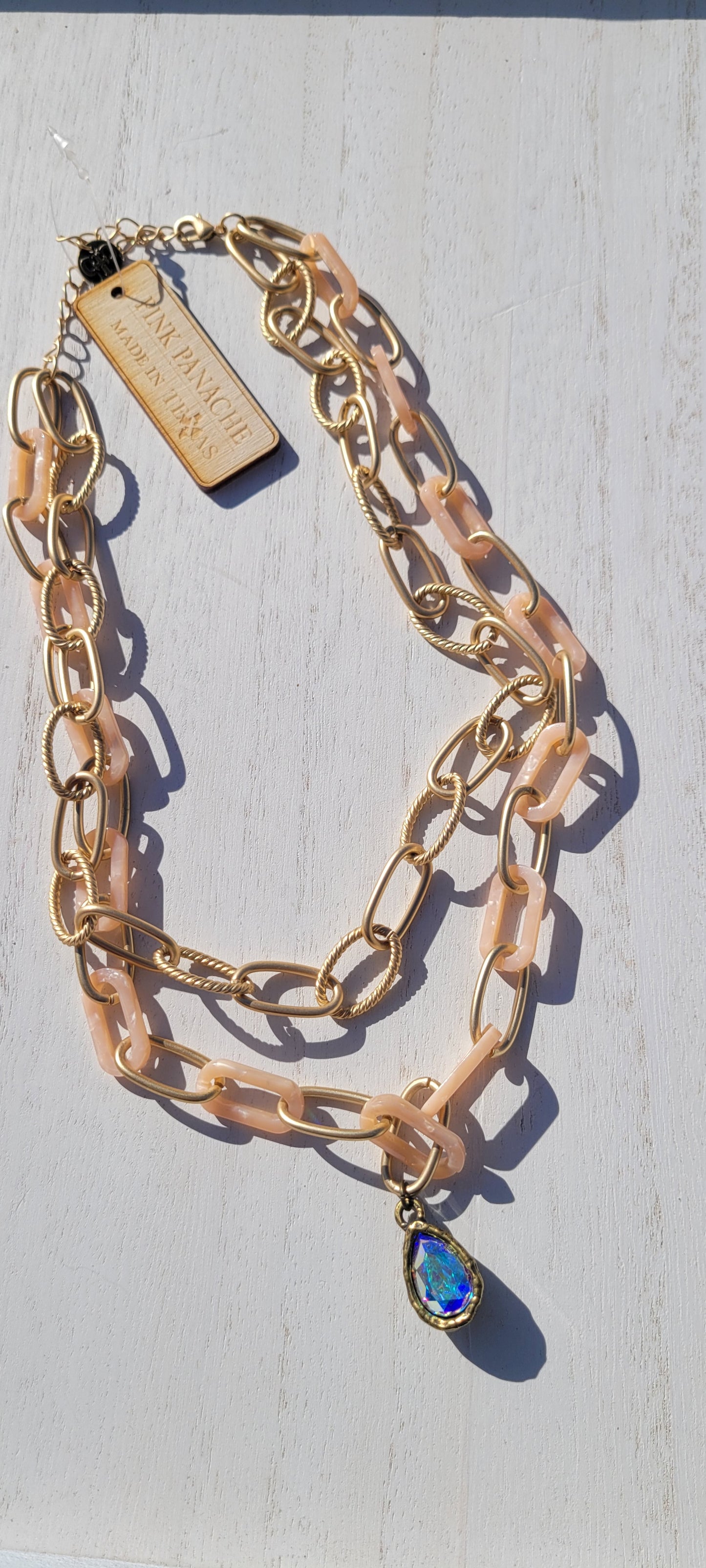 Pink Panache necklace Color: Pink acetate and gold link chain double strand necklace with small bronze/AB pear crystal drop Limited supply!