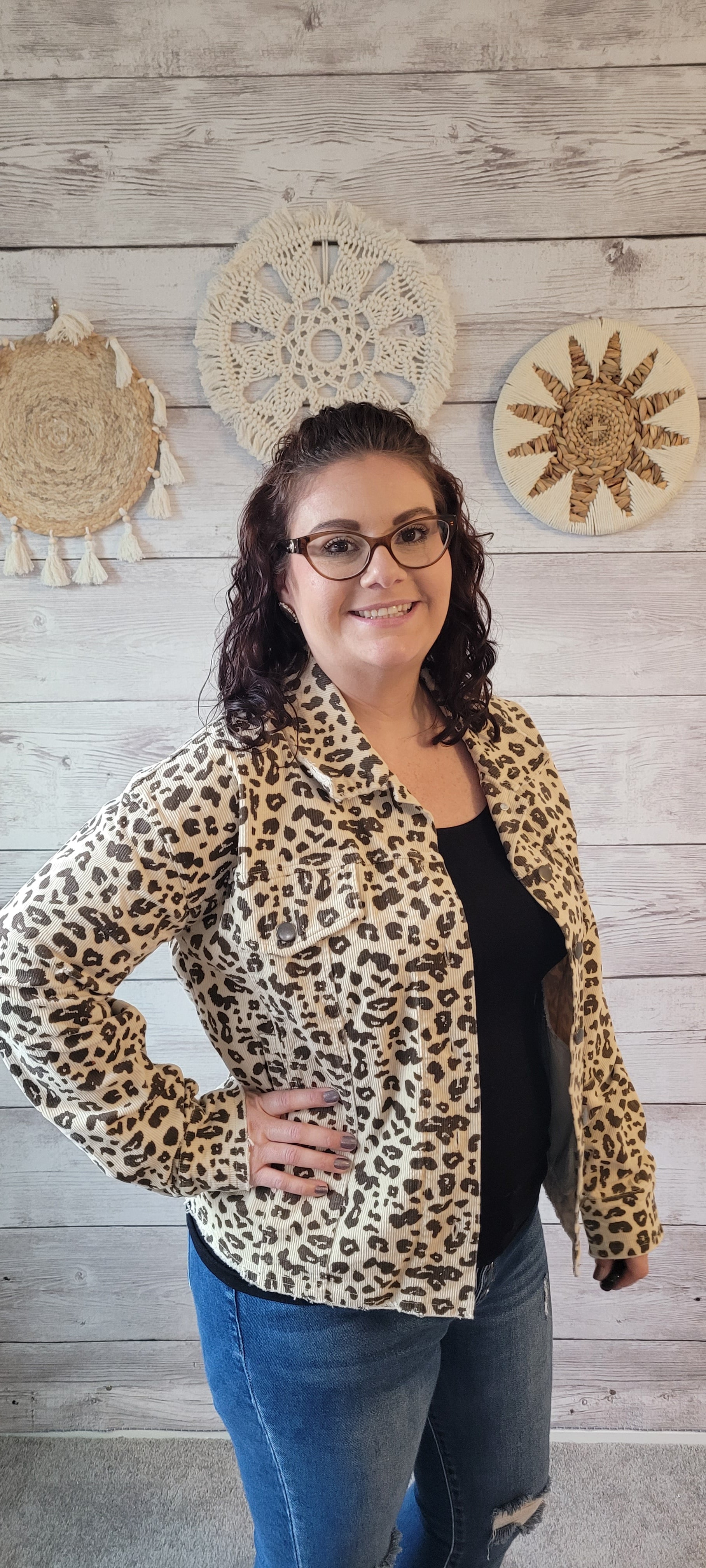 Cozy up in this out-of-the-ordinary "Emerie Ivory Washed Leopard Trucker Jacket". A fashion statement with flair, this frayed-edge beauty features metal button front closure and plenty of pockets for your stuff. Put it on and get ready to roar! Sizes small through large.