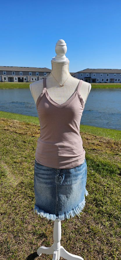 This “Basic Babe Tank Top: Ash Mocha” features a ribbed fabric, sleeveless tank top with v-neck and back. This is a great basic staple piece! Sizes small through x-large.