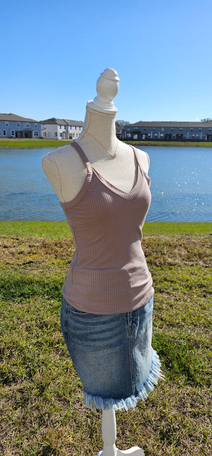 This “Basic Babe Tank Top: Ash Mocha” features a ribbed fabric, sleeveless tank top with v-neck and back. This is a great basic staple piece! Sizes small through x-large.
