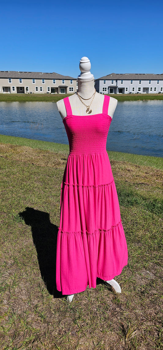 Pink smocked tiered midi dress, square neck, smocked top, wide straps. Sizes small through x-large.