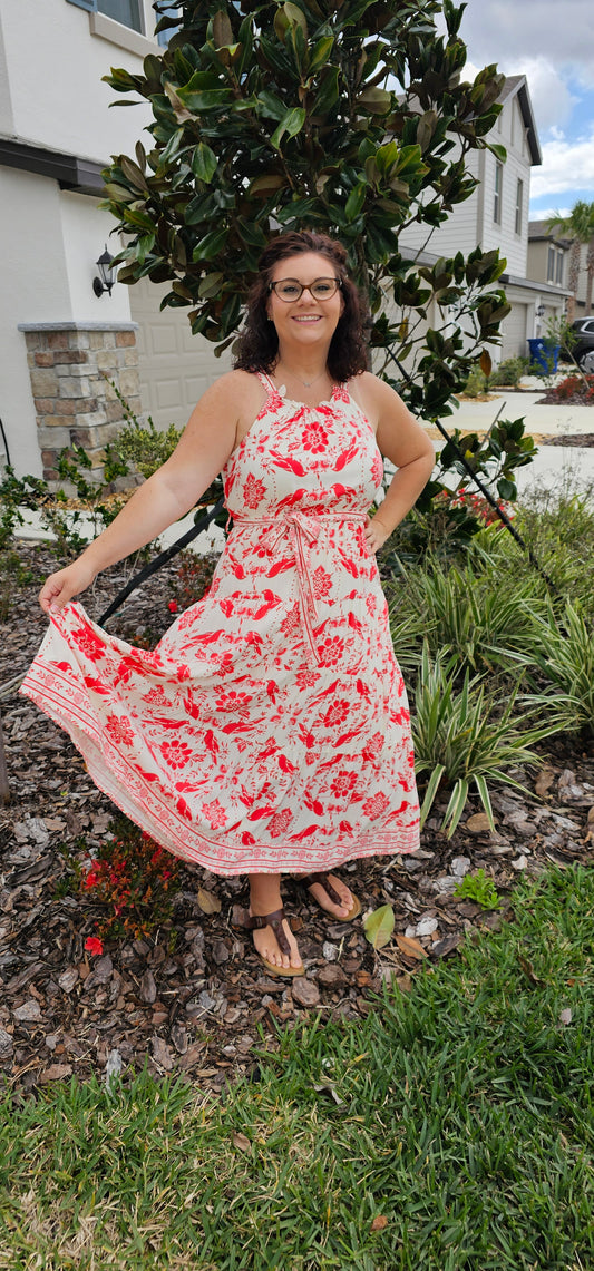 Look like a Pinterest board IRL with our A Little Birdie Told Me Maxi Dress! Featuring a halter neckline with tie closure, a self-tie waist and a tiered skirt, you'll feel like a delicate flower in this dress. Not to mention the adorable border print of birds and florals! Let your inner boho shine with this one-of-a-kind look. Sizes small through large.