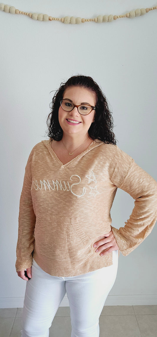 Perfect combination of comfort and style! This hoodie sweater features a playful embroidered "summer" with stars and a v-neck cut. With a kangaroo pouch and lightweight fabric, it's perfect for those cool summer nights. Stay cozy and stylish all season long! Sizes small through large.