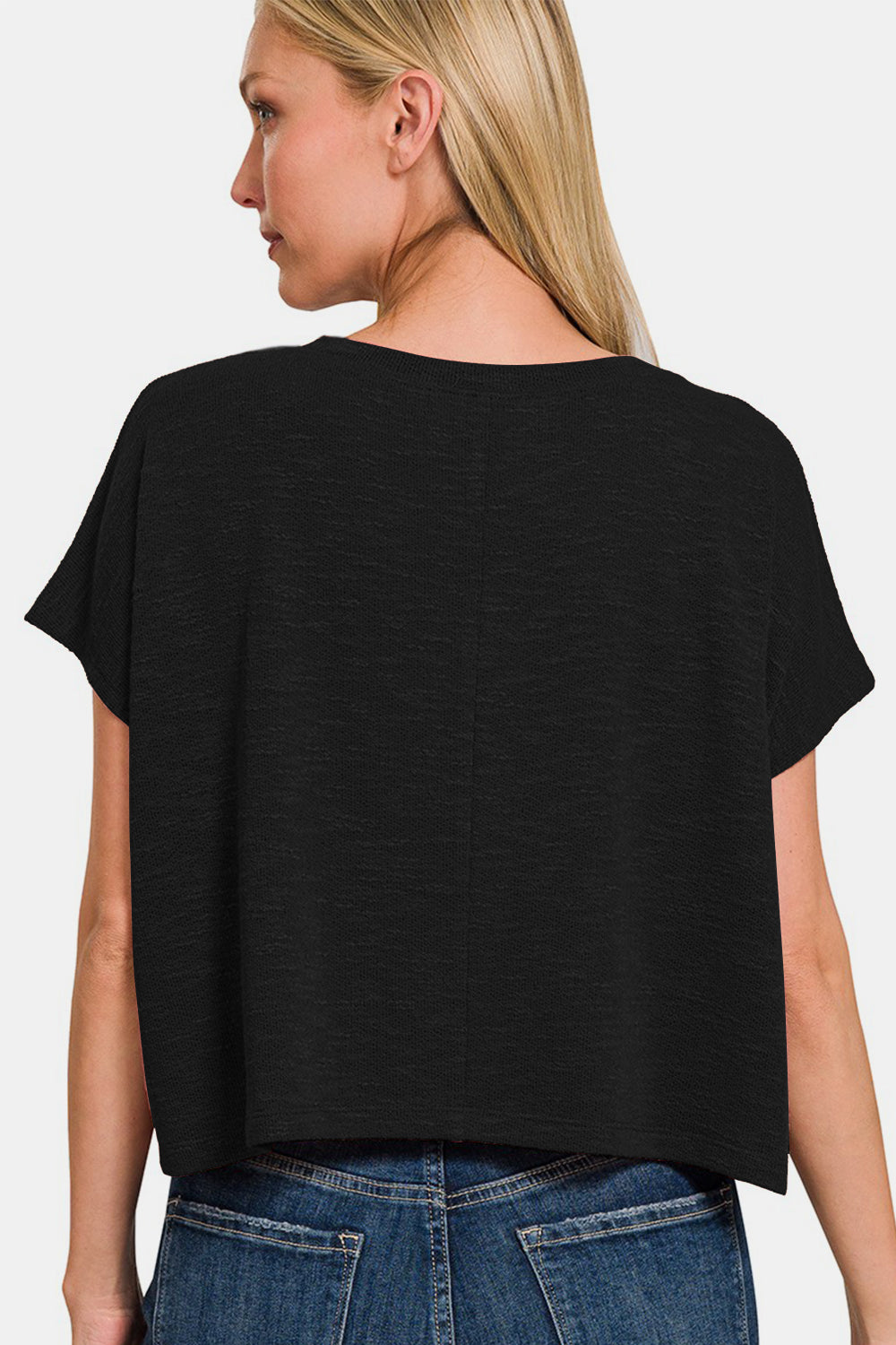 This V-Neck Short Sleeve Crop T-Shirt is a trendy and versatile piece for your wardrobe. The V-neck design adds a flattering touch to the top. With its short sleeves and cropped length, this t-shirt is perfect for warmer weather or for layering. Pair it with high-waisted bottoms for a stylish and on-trend look. Add a touch of casual flair to your outfit with this crop t-shirt that can easily be dressed up or down. Update your collection with this fashionable and comfortable V-neck crop t-shirt. S-XL