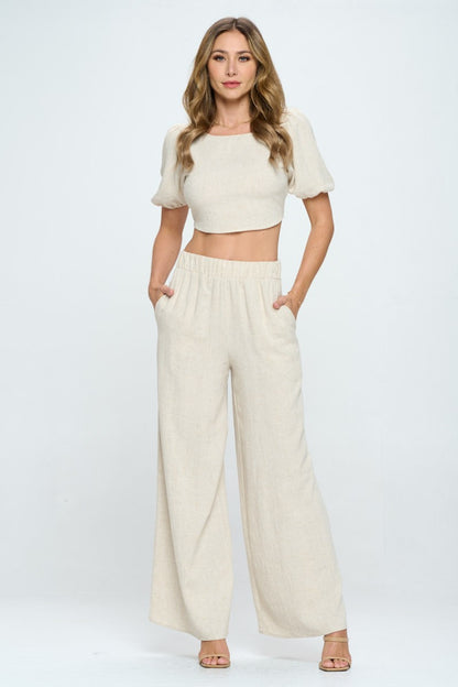These linen wide leg pants are stylish and functional with the added convenience of pockets. Made from breathable linen fabric, they are perfect for keeping cool and comfortable during warm weather. The wide leg design adds a touch of elegance while allowing for ease of movement.  S  - L