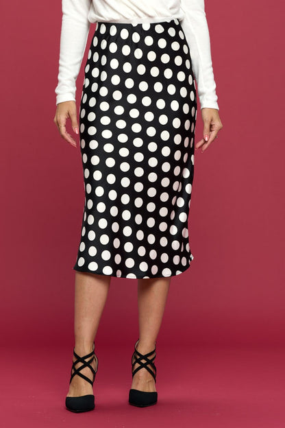 This polka dot satin midi skirt is a timeless and versatile piece that exudes elegance and charm. The classic polka dot print adds a playful and stylish touch to the skirt, perfect for adding a fun element to your outfit.  S  -L