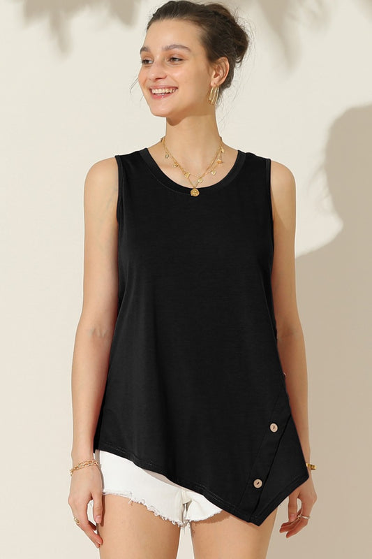 The Buttoned Uneven Hem Tank is a stylish and contemporary addition to your summer wardrobe. With its button-front design and uneven hemline, this tank top offers a unique and trendy look. The button detailing adds a touch of sophistication, while the uneven hemline adds an element of asymmetry and visual interest.  S - XL
