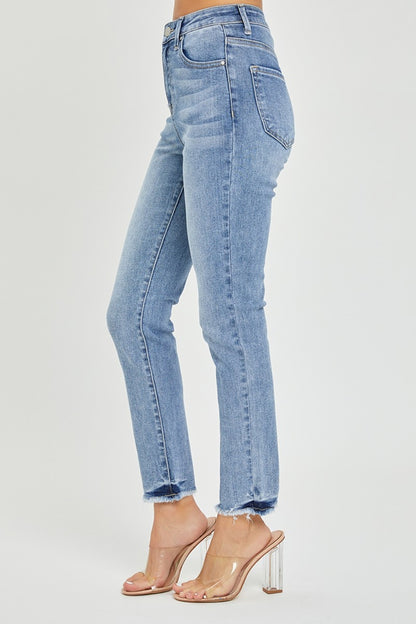 These high rise frayed hem skinny jeans are a trendy and versatile addition to your closet. The high rise design helps create a flattering silhouette and provides extra coverage. The frayed hem adds a touch of edge and style to the classic skinny jeans.  0-3X