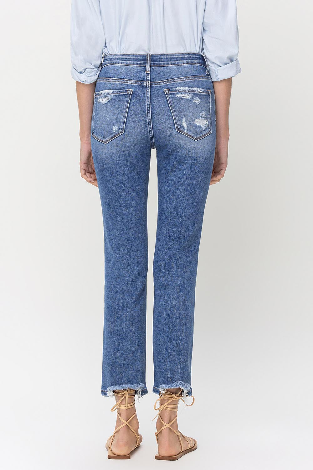 The High Rise Raw Hem Straight Jeans are a stylish and versatile choice. With their high-rise fit, they provide a flattering silhouette. The raw hem adds a trendy and edgy touch to any outfit. Made from high-quality denim, they are durable and comfortable to wear. These jeans are perfect for both casual and dressier occasions.  24 - 32