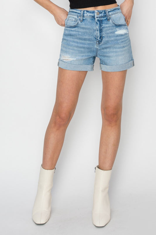 Distressed Mid-Rise Waist Denim Shorts are a stylish and trendy addition to your summer wardrobe. The distressed detailing adds a touch of edge and character to these shorts, perfect for those seeking a laid-back and relaxed vibe. With a mid-rise waist, they offer a comfortable fit that is flattering for all body types. 