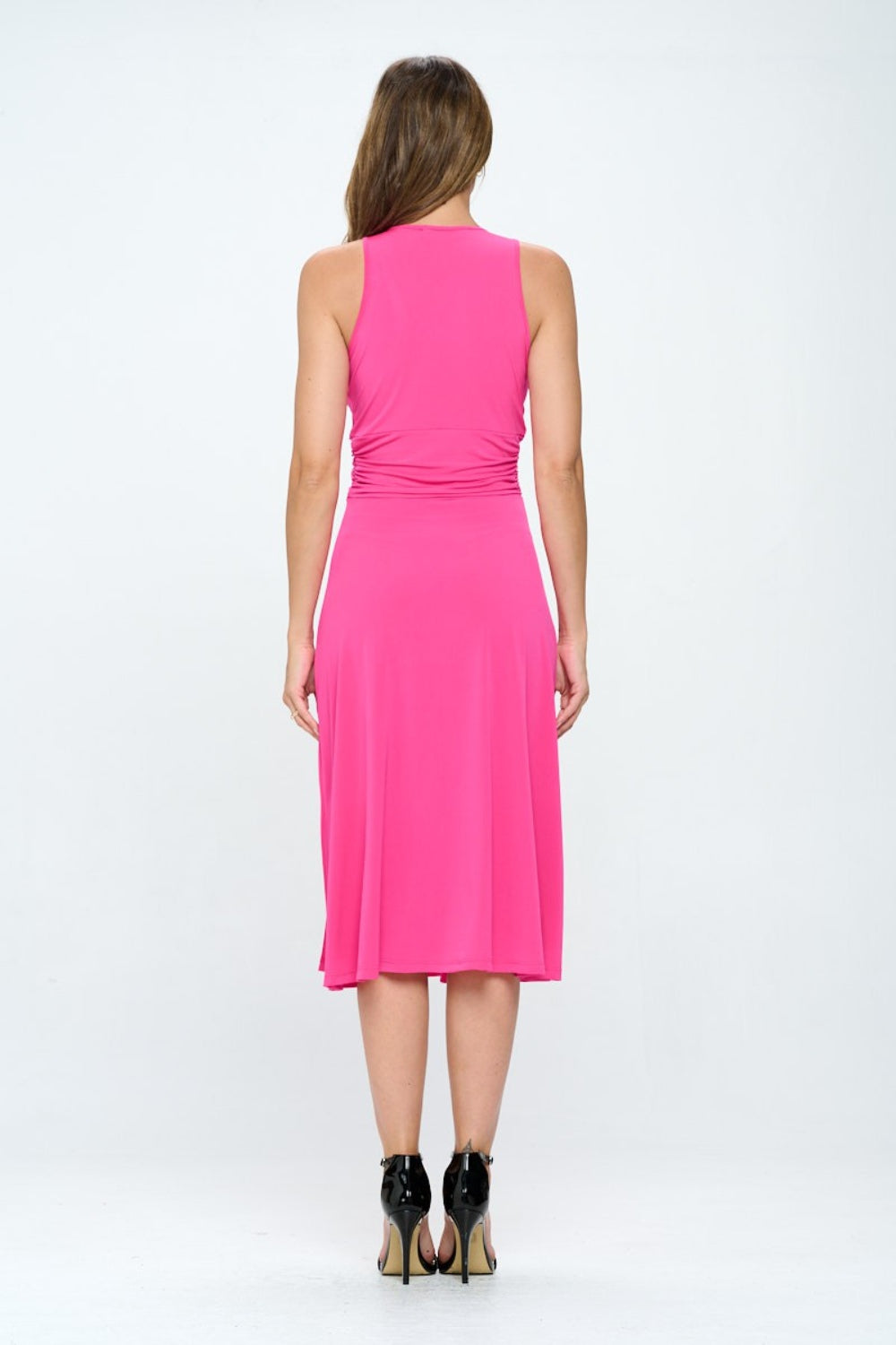 This ruched waist sleeveless slit dress is a stunning and versatile piece for any occasion. The ruched waist detailing creates a flattering silhouette by accentuating your curves. The sleeveless design is perfect for warmer weather, while the slit adds a touch of allure and movement. S  - L
