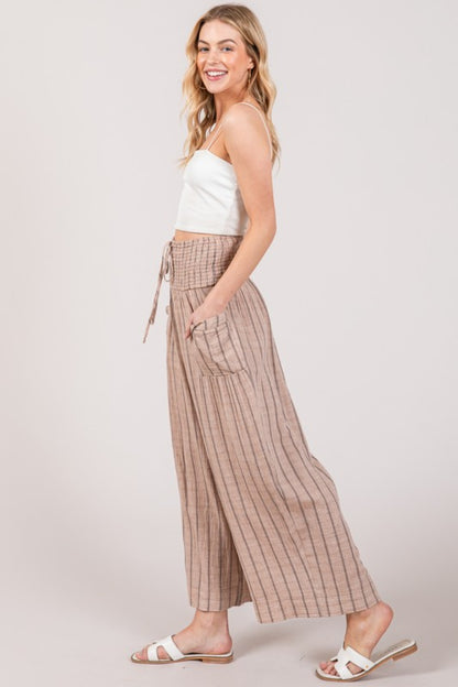 The Cotton Gauze Wash Stripe Pants are a comfortable and stylish choice for a casual and laid-back look. These pants feature a breathable cotton gauze fabric with a washed stripe pattern, adding a touch of texture and interest to your outfit. 