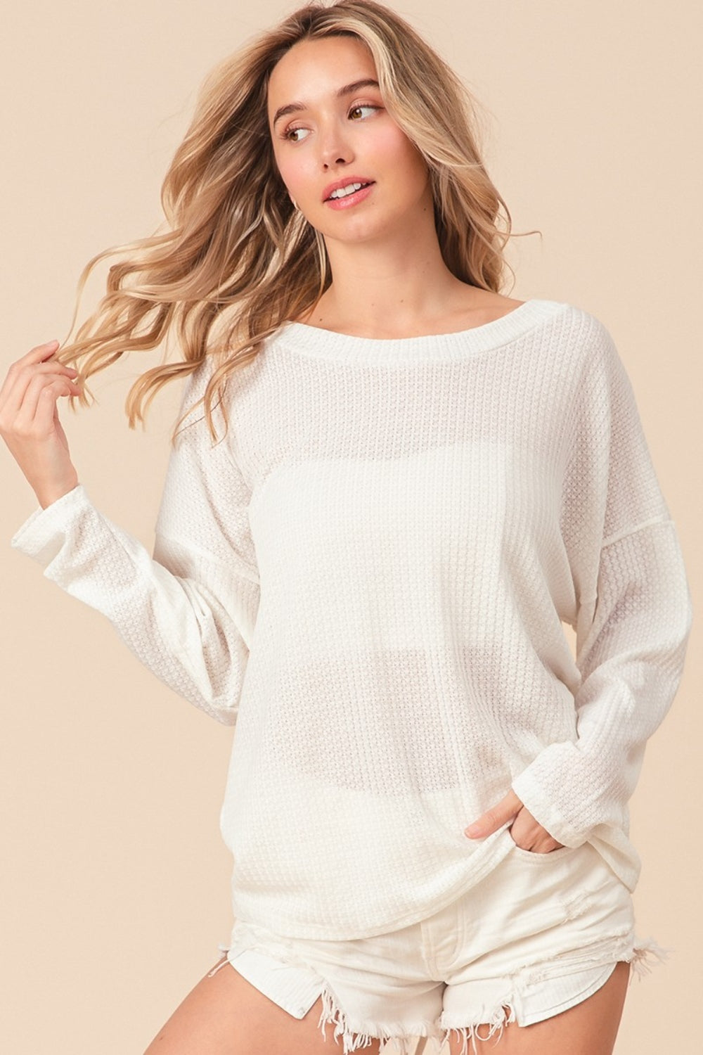The Waffled Backless Drawstring Top is a flirty and stylish choice for your summer wardrobe. Featuring a waffled texture, this top adds depth and interest to your look. The backless design with a drawstring detail creates a playful and alluring silhouette.  S - XL