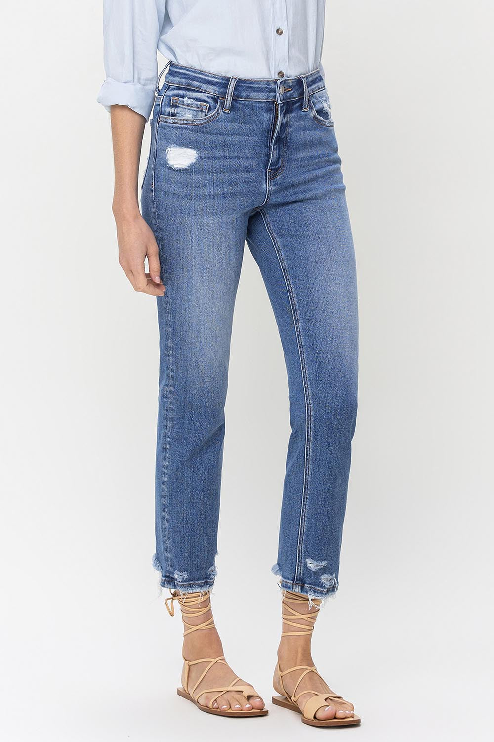 The High Rise Raw Hem Straight Jeans are a stylish and versatile choice. With their high-rise fit, they provide a flattering silhouette. The raw hem adds a trendy and edgy touch to any outfit. Made from high-quality denim, they are durable and comfortable to wear. These jeans are perfect for both casual and dressier occasions.  24 -32