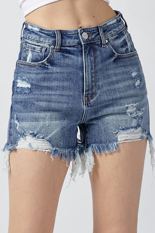 These High Rise Distressed Denim Shorts are a must-have for your summer wardrobe. The high rise design offers a flattering and comfortable fit. The distressed detailing adds a touch of edgy style to the classic denim shorts. Made from a durable and stretchy denim material, these shorts are perfect for everyday wear.  S - XL