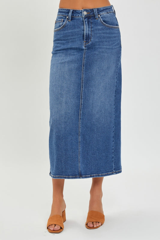 The High Rise Back Slit Denim Skirt is a stylish and versatile addition to your wardrobe. Made from high-quality denim, this skirt features a high-rise waist and a trendy back slit detail. Pair it with a tucked-in blouse and heels for a chic look, or dress it down with a graphic tee and sneakers for a more casual vibe. S - XL