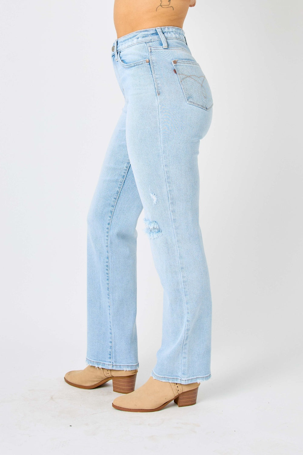 These high waist distressed straight jeans are a must-have. Their flattering cut accentuates your curves while the distressed details add an edgy vibe. Made with high-quality denim, they are both comfortable and durable. The high waist design also helps to cinch in your waist and create a slimming effect 0 -24W