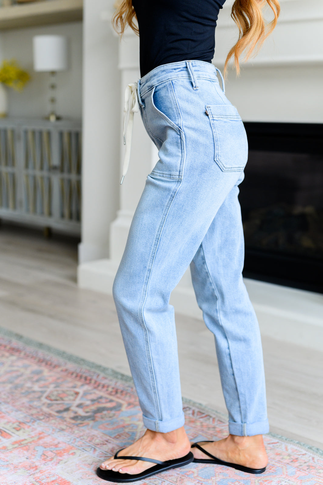 Get a retro-inspired look with our Cooper High Rise Vintage Denim Jogger! This jogger features a high rise design and a light wash for a vintage feel. The self-tie drawstring adds a touch of style, perfect for any casual outing. 0-24w