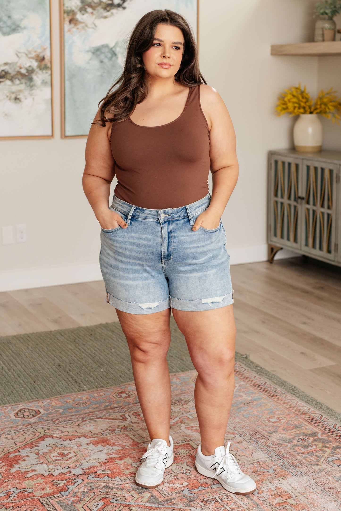 Elevate your style with our Darlene High Rise Distressed Cuffed Cutoff Shorts from Judy Blue! With the perfect inseam for everyday life, these light to medium wash shorts feature a raw cuffed hem and a slight distressed look, giving you a unique and trendy look. Show off your fashion sense and feel confident in these high rise shorts.