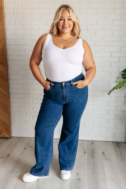 The Hazel High Rise Vintage Wide Leg Jeans are the perfect addition to your denim collection! Featuring a flattering high rise fit and a vintage wide leg cut, these non-distressed jeans are in a classic medium wash that will never go out of style. Get the perfect fit with these timeless jeans.