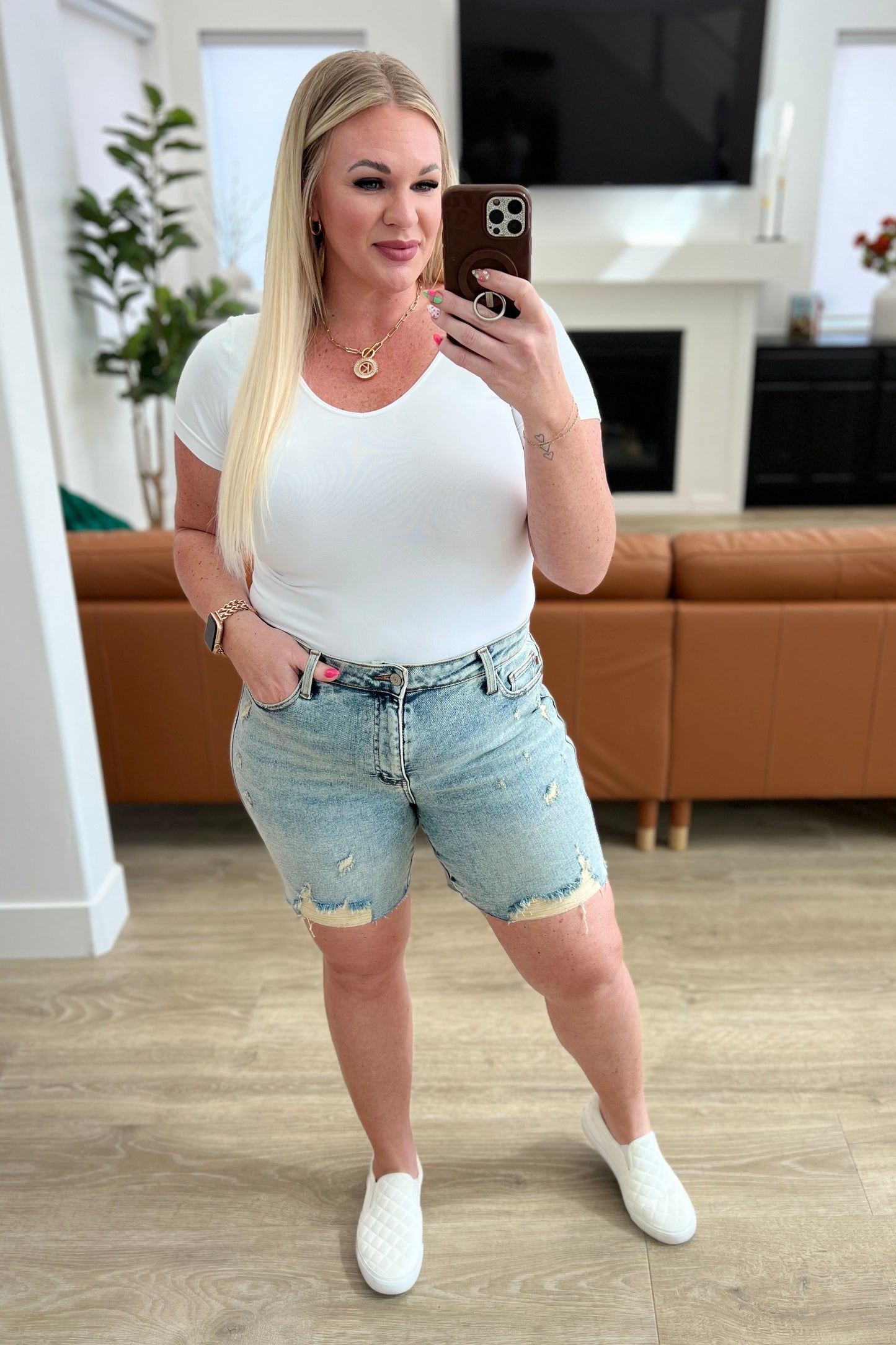 Get ready for some playful vibes with our Cindy High Rise Mineral Wash Distressed Boyfriend Shorts from Judy Blue! Featuring a high rise, comfort fit and 4-way stretch for maximum mobility. The mineral wash and cut off hem add a unique touch to these versatile shorts. Perfect for any day out (or in)! S-3X