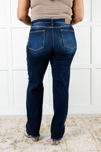 The Jacqueline Mid Rise Jean will elevate your casual look with its dark wash and non-distressed design. The straight leg silhouette flatters any figure, while the frayed hem adds a touch of playful flair. Perfect for any occasion, this jean is a must-have for your wardrobe.

Judy Blue
Mid Rise
Zip Fly
Dark Wash
Straight Leg Silhouette
Raw Hem
93% Cotton, 6% Polyester, 1% Spandex
True to Judy Blue Sizing