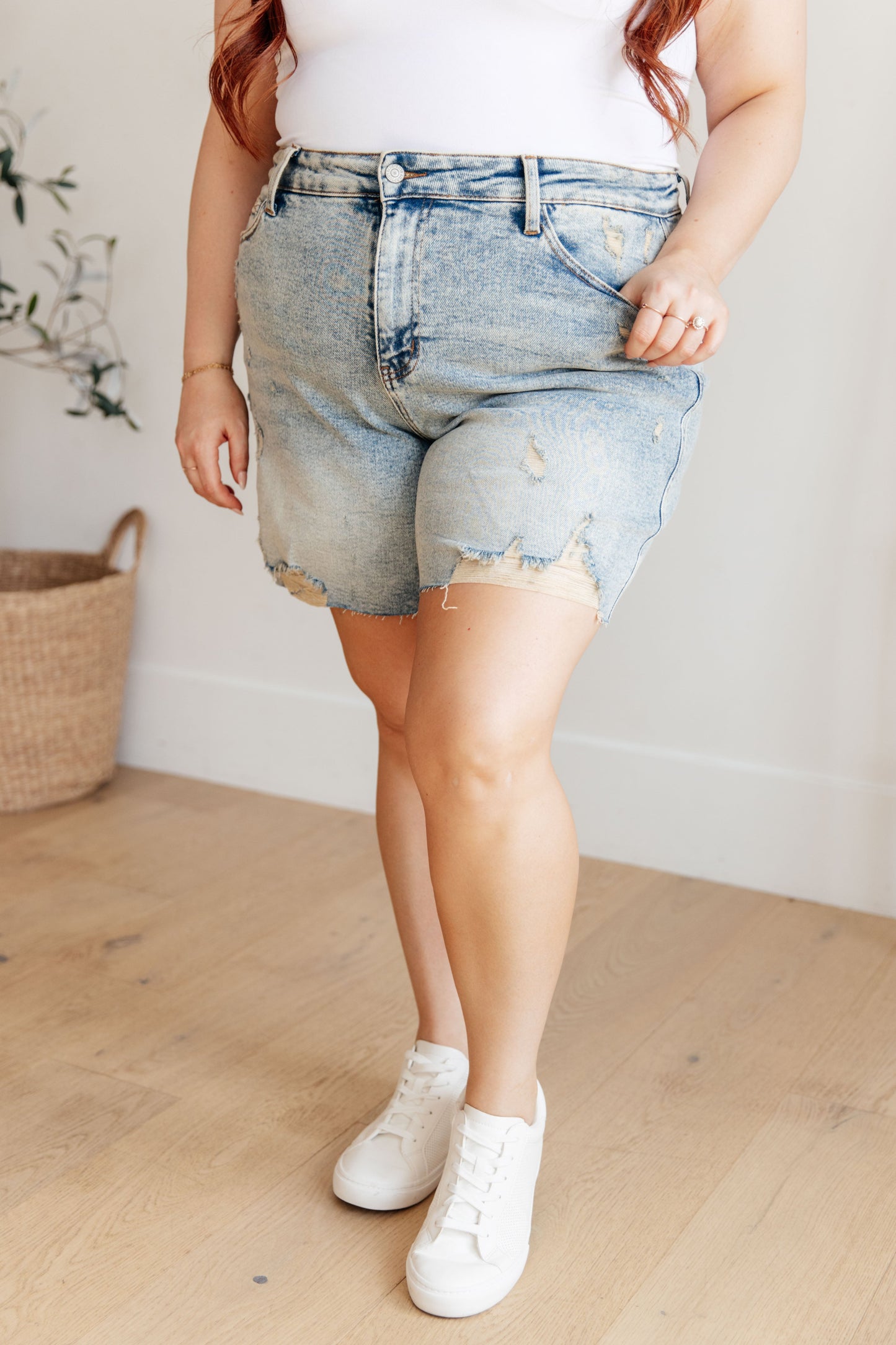 Get ready for some playful vibes with our Cindy High Rise Mineral Wash Distressed Boyfriend Shorts from Judy Blue! Featuring a high rise, comfort fit and 4-way stretch for maximum mobility. The mineral wash and cut off hem add a unique touch to these versatile shorts. Perfect for any day out (or in)! S-3X