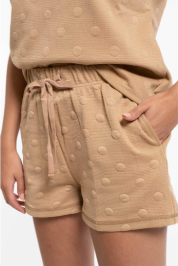 Stay chic and comfy in this adorable lounge set with swiss dots! These cute shorts and short sleeves will have you lounging in style (in a jiffy!). Whether you’re working from home or just kicking back, you’ll be the queen of the living room!