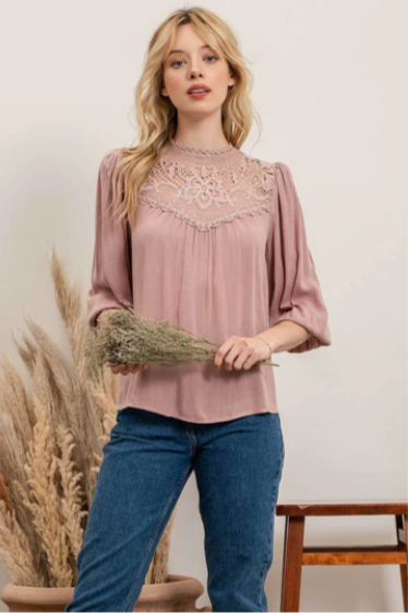 Rock your look with this ravishing top that'll take your fashion to the next level! With its elegant lace mock neck, stylish back-button closure with keyhole, and oh-so-pretty front lace inset and pleated bubble sleeves, you'll be sure to draw admiring glances wherever you go. Let's get fabulous!