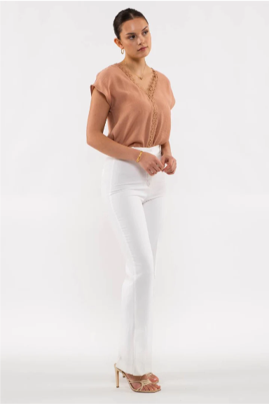 Step out in style with the "Roxie Sienna" top! Featuring a flattering V-neckline with lace edge and stylish short dolman sleeves, you'll be ready for the day without any extra effort. Who said looking great can't be effortless?