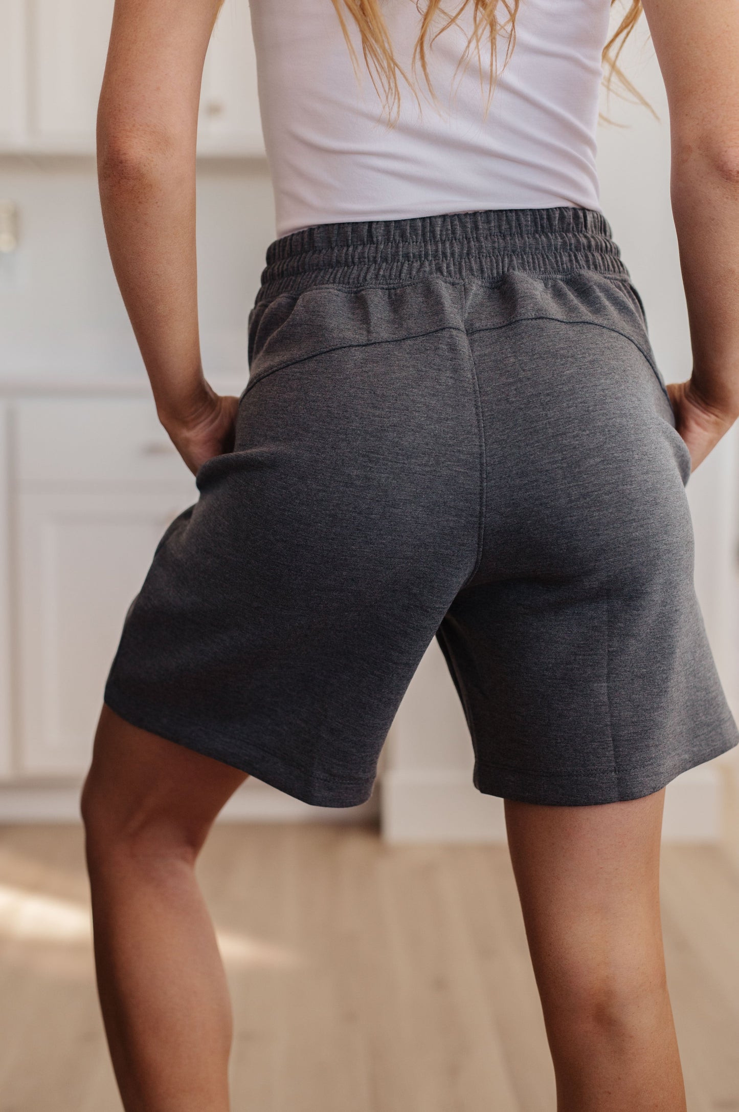 Experience total comfort and style in our Settle In Dad Shorts. Made with micro scuba fabric for a snug-fitting, high-rise design, these shorts feature an elastic waistband and functional drawstring for customizable fit. Wear along with the Settle In Mock Neck Sweatshirt for a perfect match. Get ready to settle in! S-3X