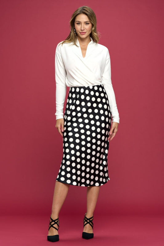 This polka dot satin midi skirt is a timeless and versatile piece that exudes elegance and charm. The classic polka dot print adds a playful and stylish touch to the skirt, perfect for adding a fun element to your outfit.  S  - L