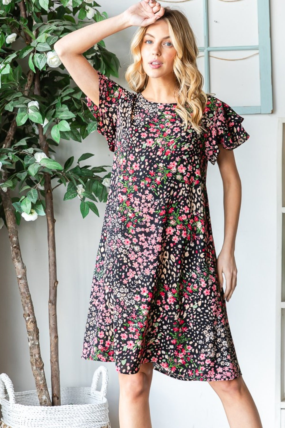 Get ready to turn heads in this stunning Printed Ruffled Short Sleeve Dress. With its eye-catching print and playful ruffled sleeves, this dress exudes feminine charm. The best part? It comes with pockets, adding a practical touch to this stylish piece. S - 3X