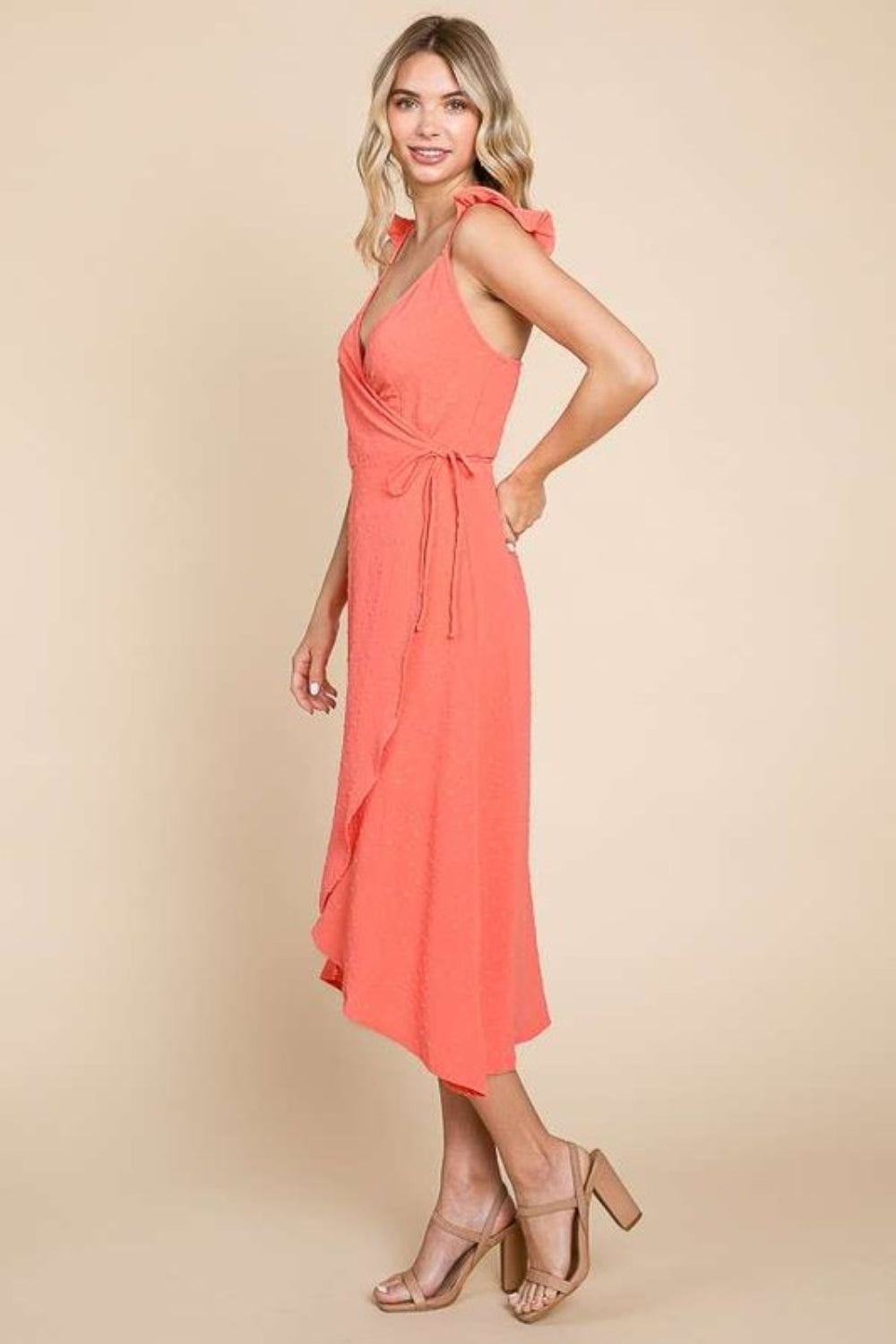 The Ruffle Detail Surplice Wrap Slip Dress is a stunning and versatile piece that exudes femininity and charm. With its delicate ruffle detailing and flattering wrap silhouette, this dress is perfect for any special occasion or evening event.  S-XL