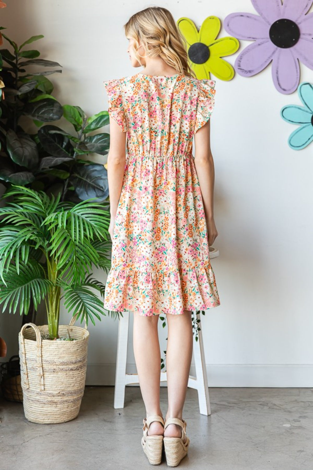 Introducing the Floral Ruffled V-Neck Dress. This stunning dress combines feminine elegance with a touch of playfulness. The floral pattern adds a romantic and vibrant flair, while the ruffled details create a whimsical and graceful look. S - 3X