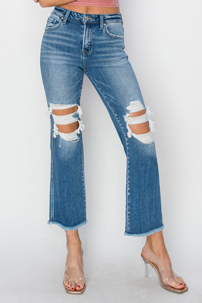 These Mid Rise Distressed Cropped Flare Jeans are a trendy and edgy addition to your denim collection. The mid-rise fit offers a flattering and comfortable silhouette, while the distressed detailing adds a touch of rugged charm.  0 -15