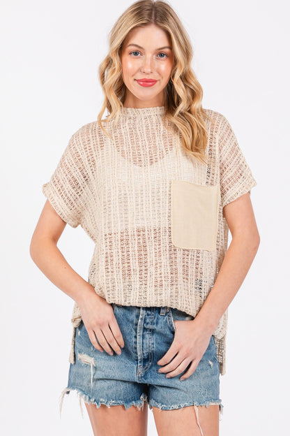 The See Through Crochet Mock Neck Cover Up is a stylish and versatile addition to your wardrobe. Perfect for layering over a swimsuit or pairing with a camisole for a boho-chic look. The intricate crochet detailing adds a touch of texture and visual interest.  S-L