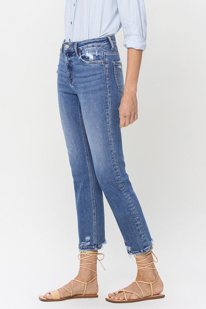 The High Rise Raw Hem Straight Jeans are a stylish and versatile choice. With their high-rise fit, they provide a flattering silhouette. The raw hem adds a trendy and edgy touch to any outfit. Made from high-quality denim, they are durable and comfortable to wear. These jeans are perfect for both casual and dressier occasions. 