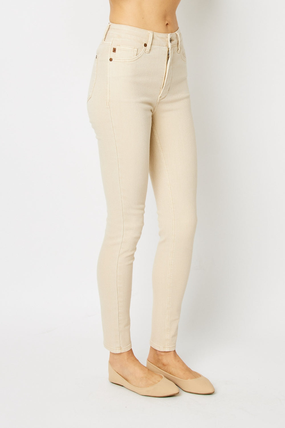 Introducing our new Garment Dyed Tummy Control Skinny Jeans. These jeans are designed to give you an effortlessly slim and flattering look. With their high-rise waist and tummy control panel, they provide the perfect amount of support and comfort.  1 - 22W