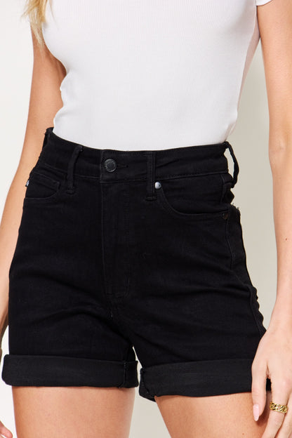 These High Waist Tummy Control Cuffed Denim Shorts are the perfect addition to any summer wardrobe. With their high waist design, they provide extra coverage and support, helping to create a slimming and flattering effect on the stomach area. The cuffed hem adds a stylish touch, making these shorts versatile enough to be dressed up or down for any occasion. S  - 3X