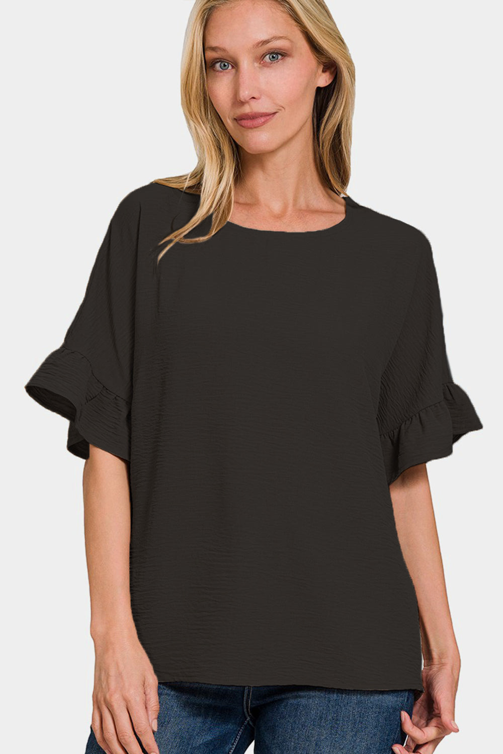 This V-Neck Flutter Sleeve Top is a versatile and feminine addition to your wardrobe. The V-neckline adds a flattering touch to the design. The flutter sleeves give a soft and romantic feel to this top. Perfect for both casual and dressy occasions, this top can be dressed up or down effortlessly. Pair it with jeans for a casual look or with a skirt for a more polished outfit.  S-XL