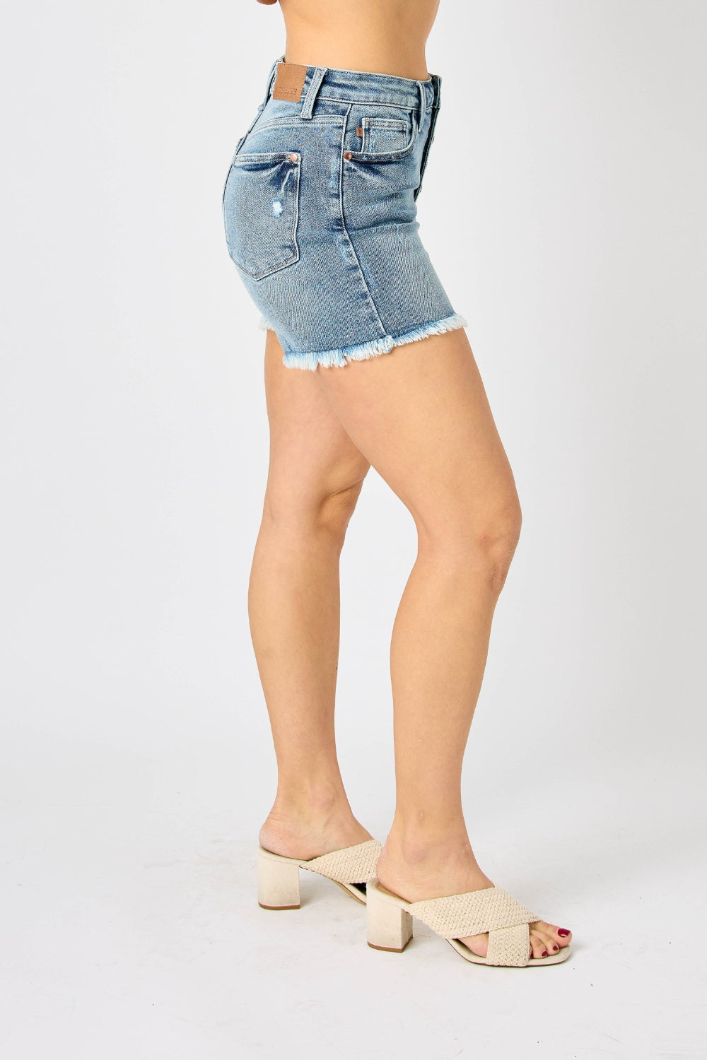Button Fly Raw Hem Denim Shorts are a trendy and stylish choice for any casual outfit. With their button fly closure and raw hem detailing, these shorts offer a unique and edgy look. Made from high-quality denim, they are both durable and comfortable to wear.  S - 3X