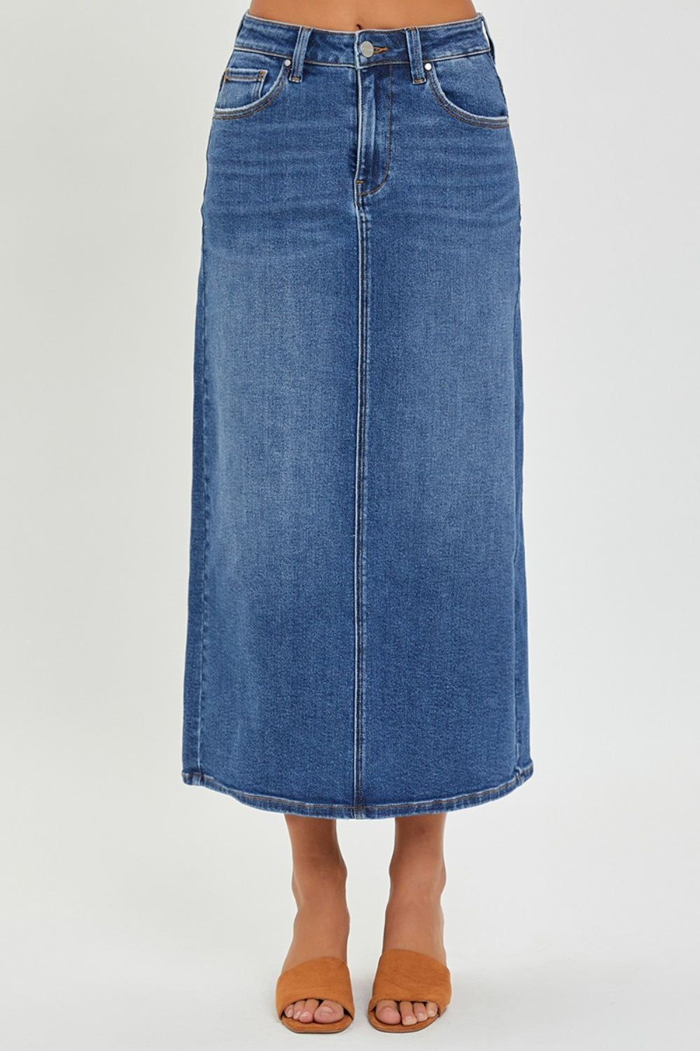 The High Rise Back Slit Denim Skirt is a stylish and versatile addition to your wardrobe. Made from high-quality denim, this skirt features a high-rise waist and a trendy back slit detail. Pair it with a tucked-in blouse and heels for a chic look, or dress it down with a graphic tee and sneakers for a more casual vibe. S  - XL
