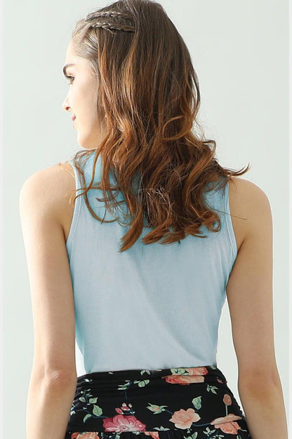 The Notched Rib Knit Tank is a versatile and trendy piece that will elevate your summer wardrobe. Its ribbed texture adds interest and dimension to any outfit. The notched neckline adds a unique and stylish touch. Made with high-quality materials, this tank is comfortable and durable.  S - XL