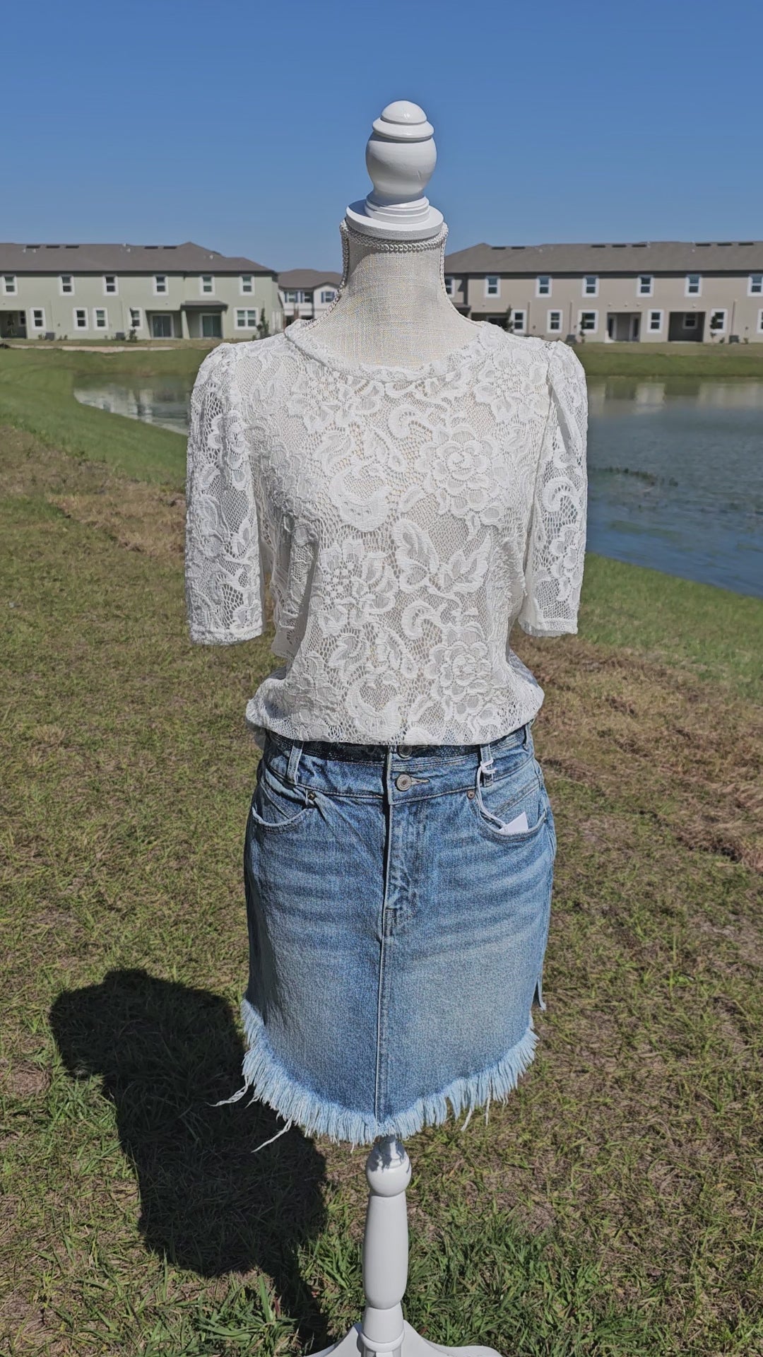 “All About The Lace” is a gorgeous white lace top. This is a short sleeve shirt, featuring floral lace print, bubble sleeves, rounded neckline and hemline. It does have stretch! Pair with your favorite cami or bralette. Sizes small through large.
