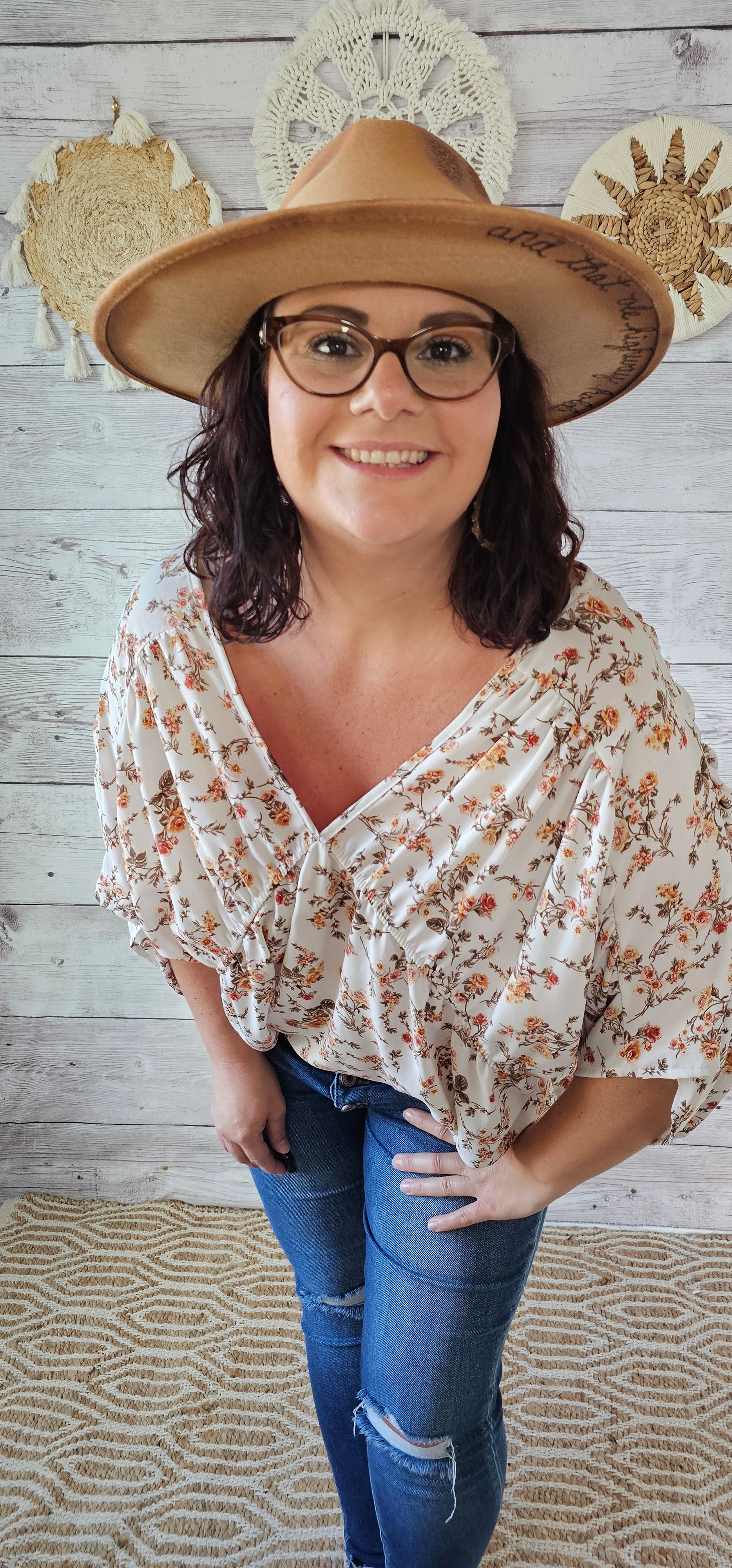 “Rosy Future” is a ivory loose fitting, flowy top. It features a rosy floral print, v-neck and v-back, pleated sleeves. This top is sheer but not see through. It is great for vacation, an evening out or casual event. Sizes small through large.